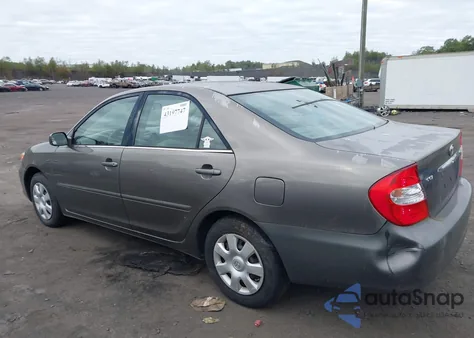 2002 Toyota Camry Le from USA, damaged, VIN 4T1BE32K42U515374